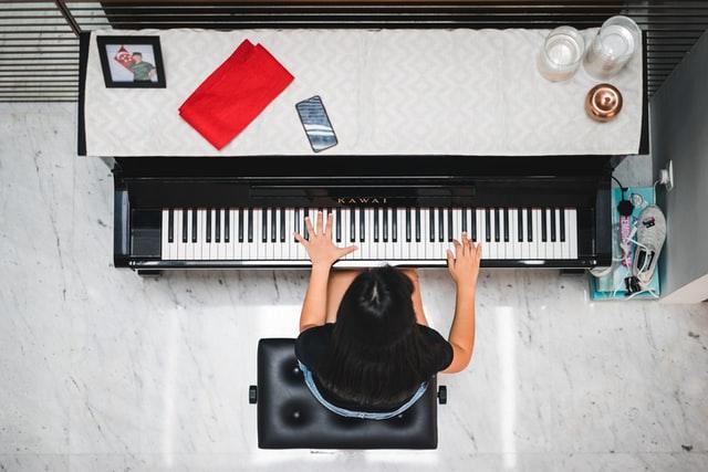 Child practicing piano